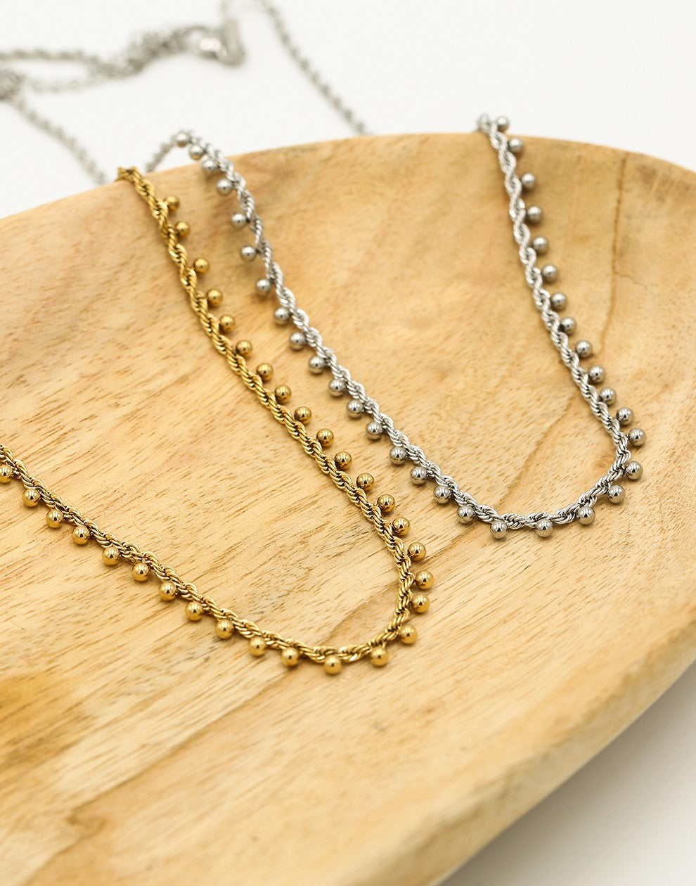 Gedraaide ketting bolletjes goudkleurig