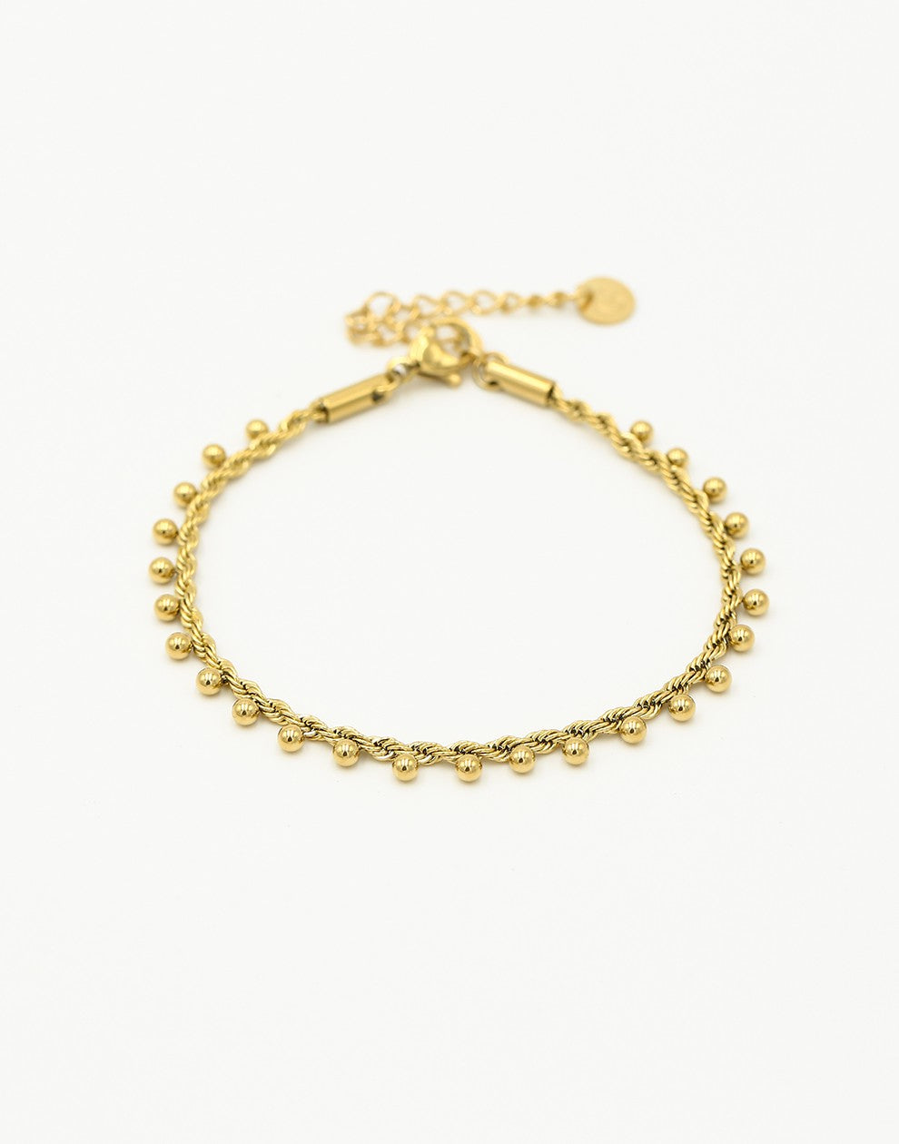 Gedraaide armband bolletjes goudkleurig