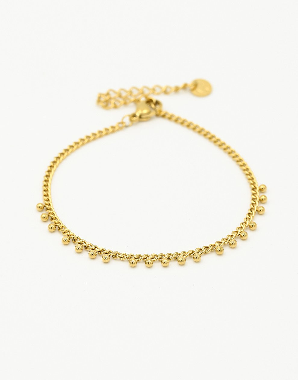 Schakelarmband bolletjes goudkleurig
