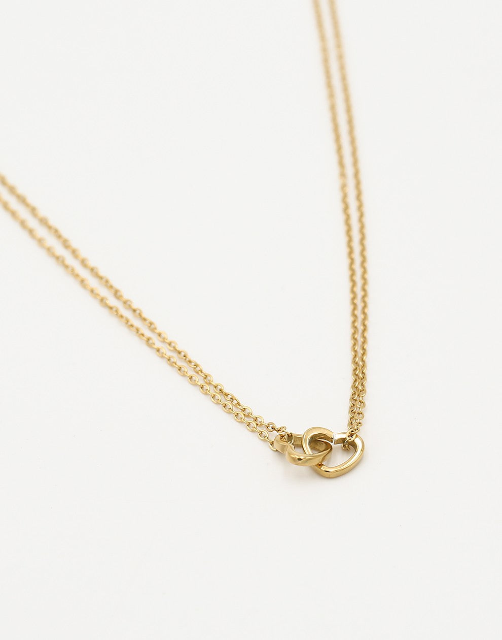 Fine necklace with double hearts in gold color
