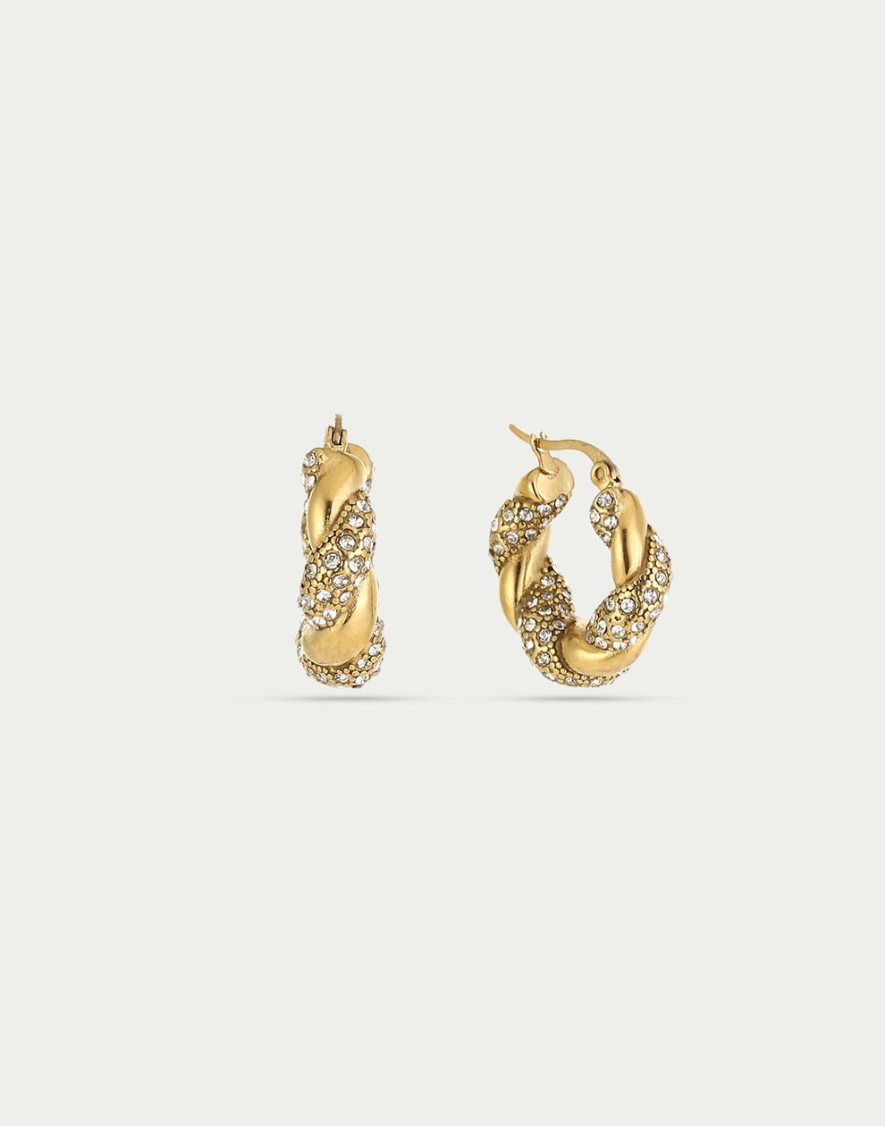 Twisted hoop earrings with rhinestones in gold color