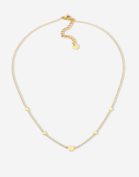gold-colored heart necklace