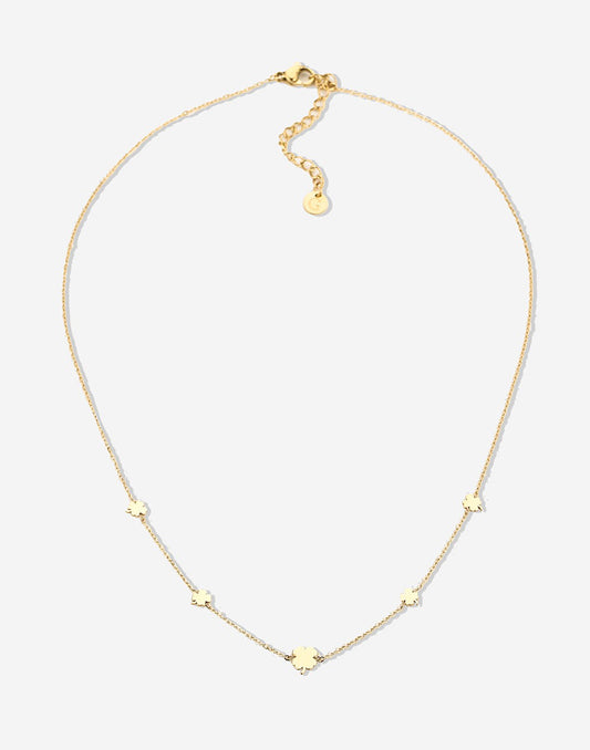 gold-colored clover necklace