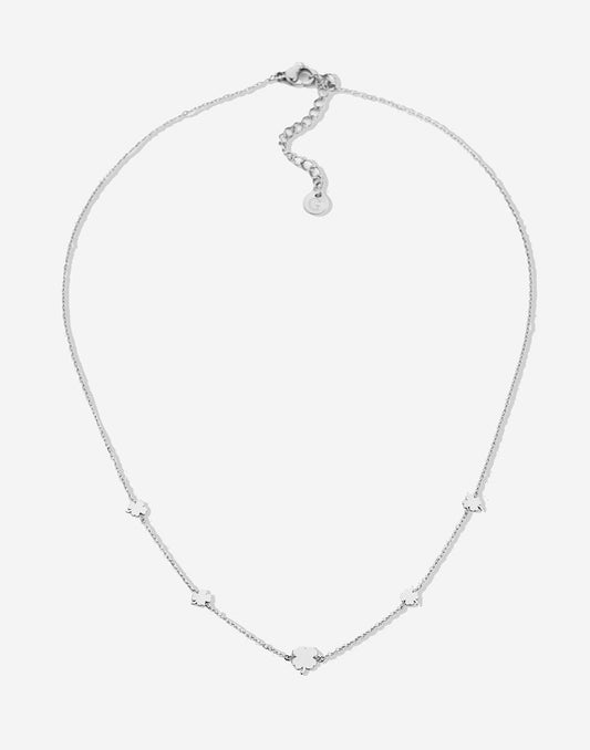 silver-colored clover necklace