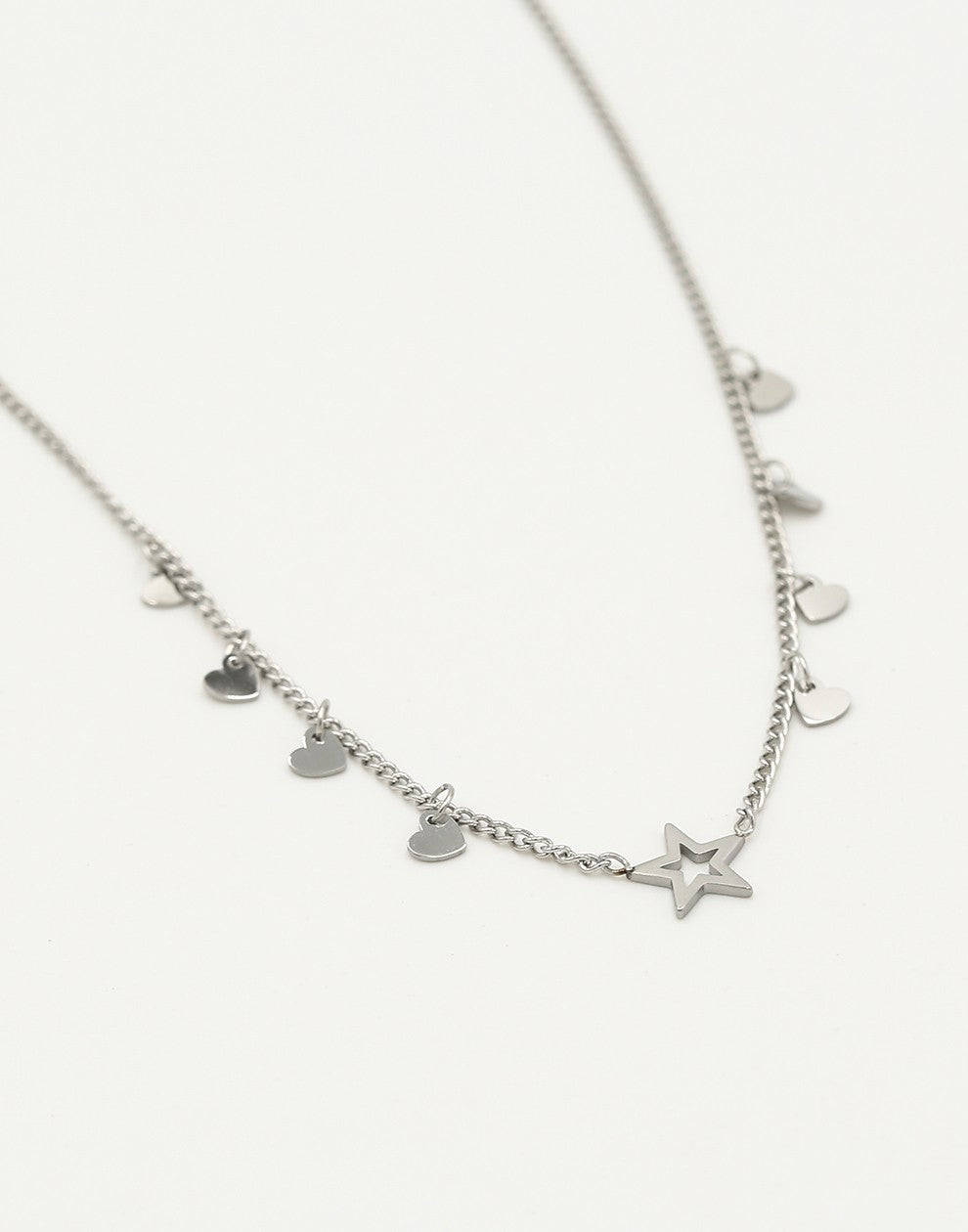 Ketting open ster met hartjes zilverkleurig