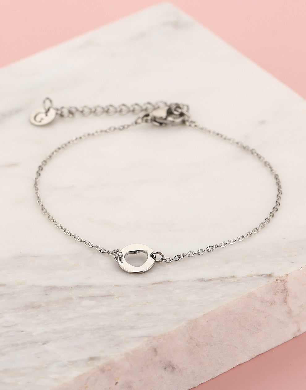 armband uitgesneden hartje zilverkleurig