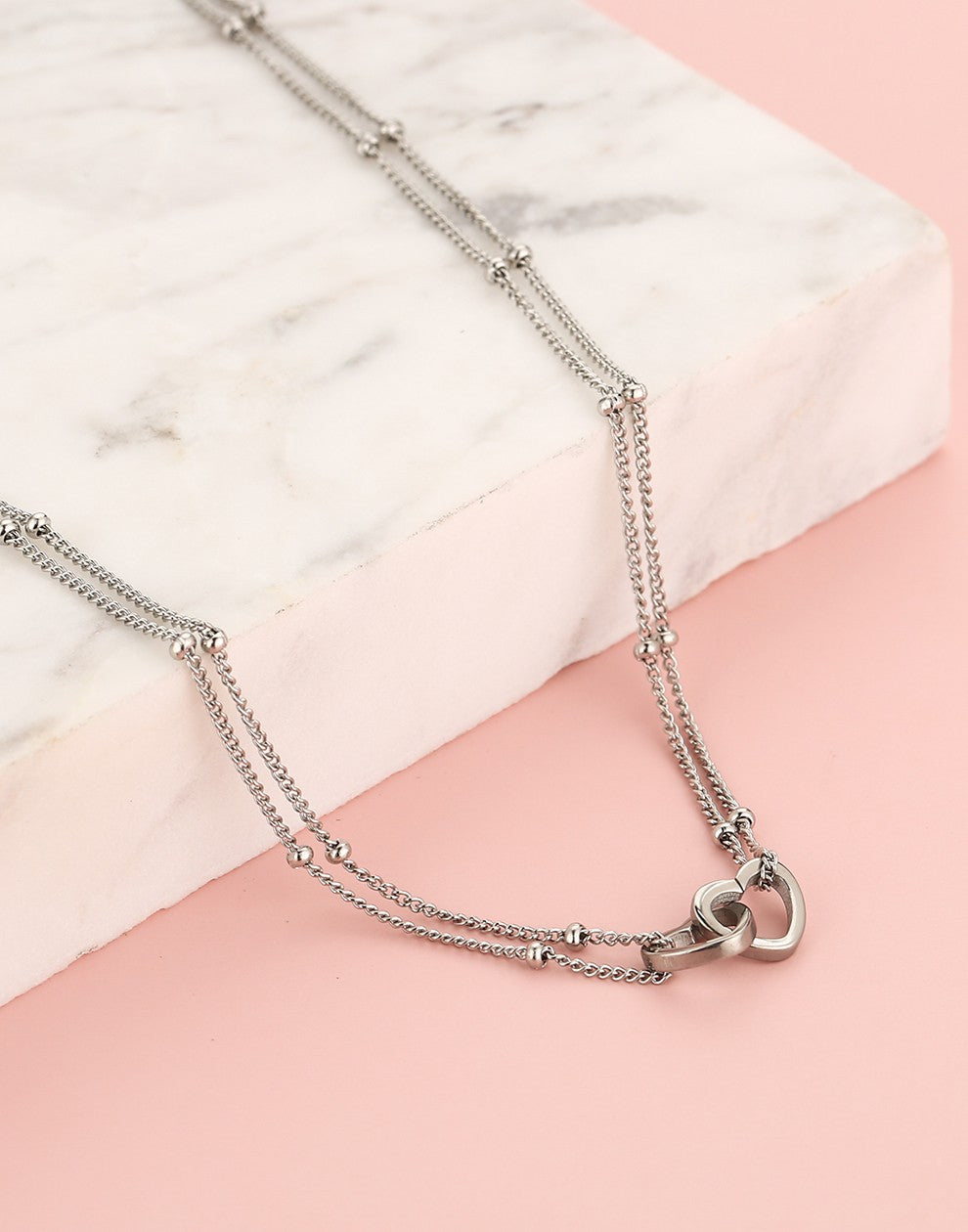 ketting bolletjes met dubbele hartjes zilverkleurig