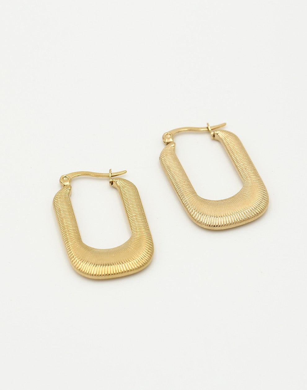 statement oorhangers met motief goudkleurig