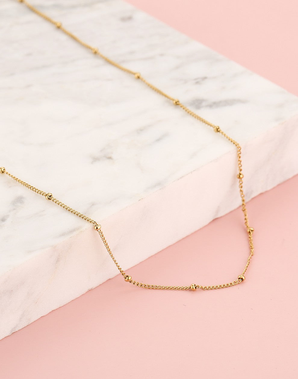 Ketting goudkleurig bolletjes 45cm