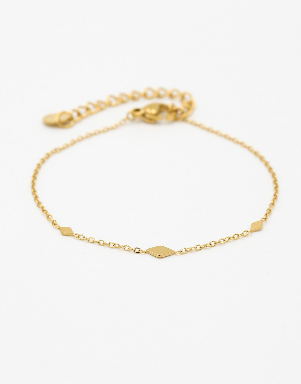 gold-colored diamond bracelet