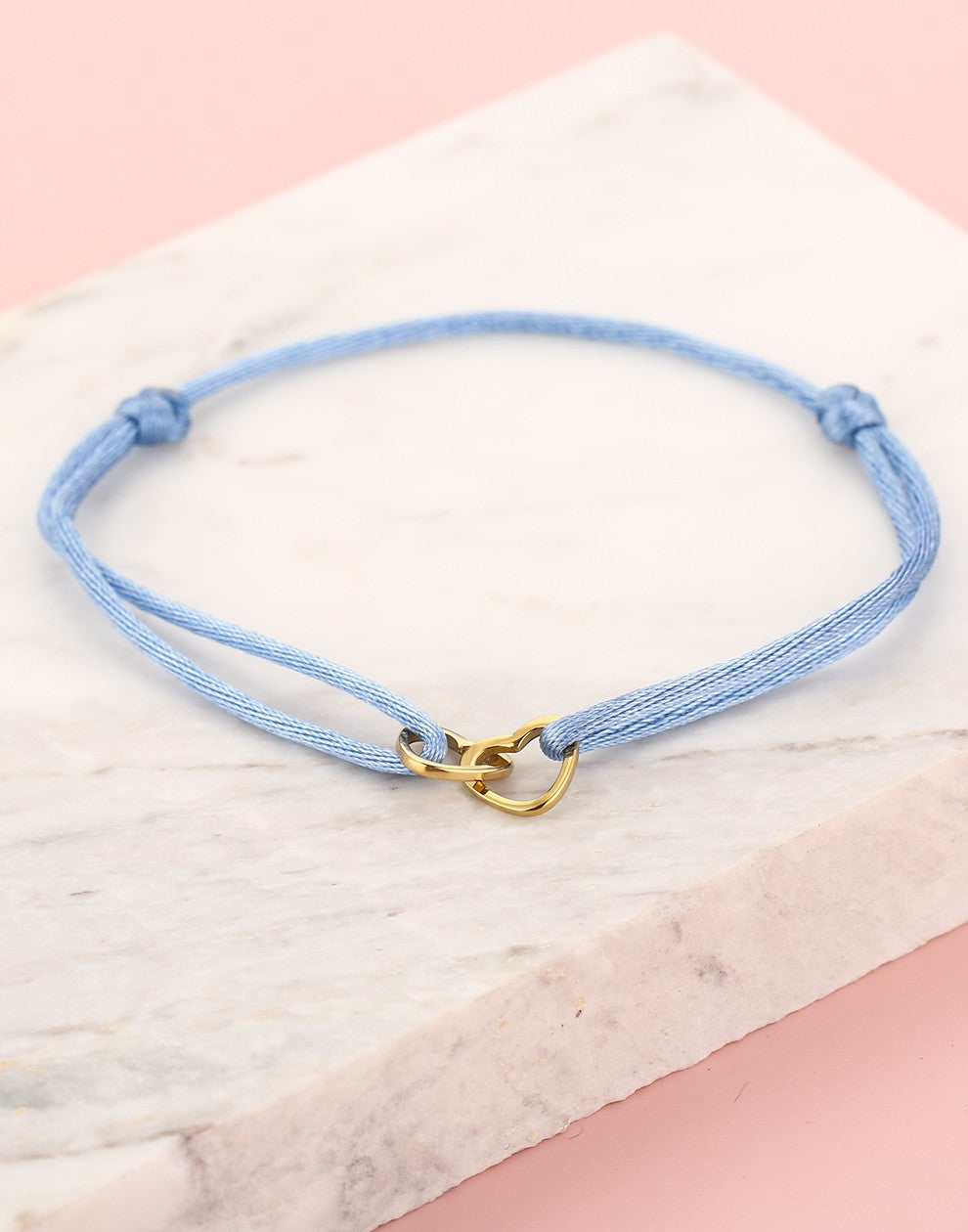armband dubbele hartjes blauw goudkleurig