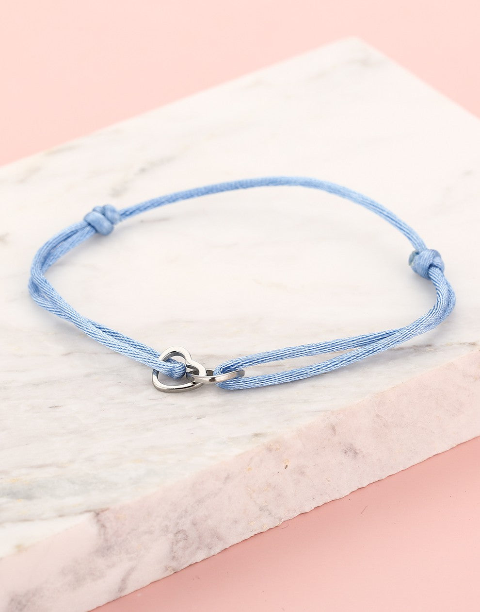 armband dubbele hartjes blauw zilverkleurig