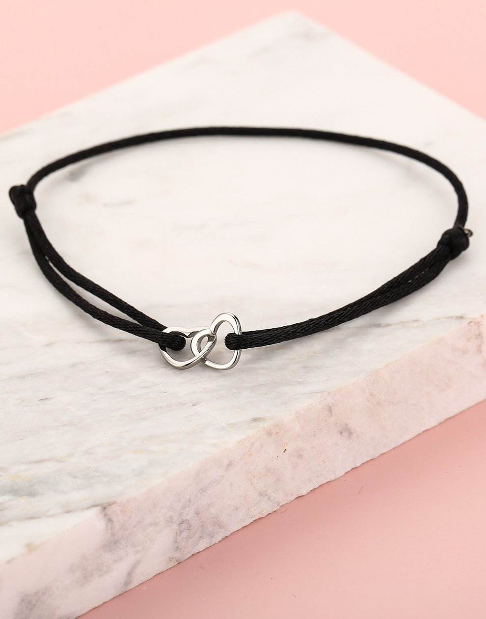 armband dubbele hartjes zwart zilverkleurig