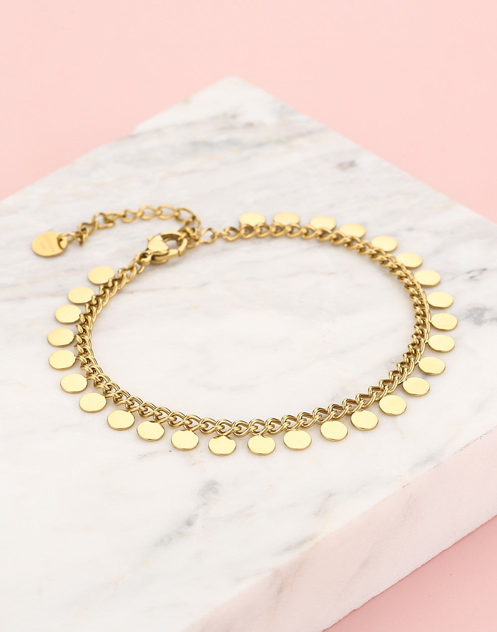 schakelarmband met muntjes goudkleurig