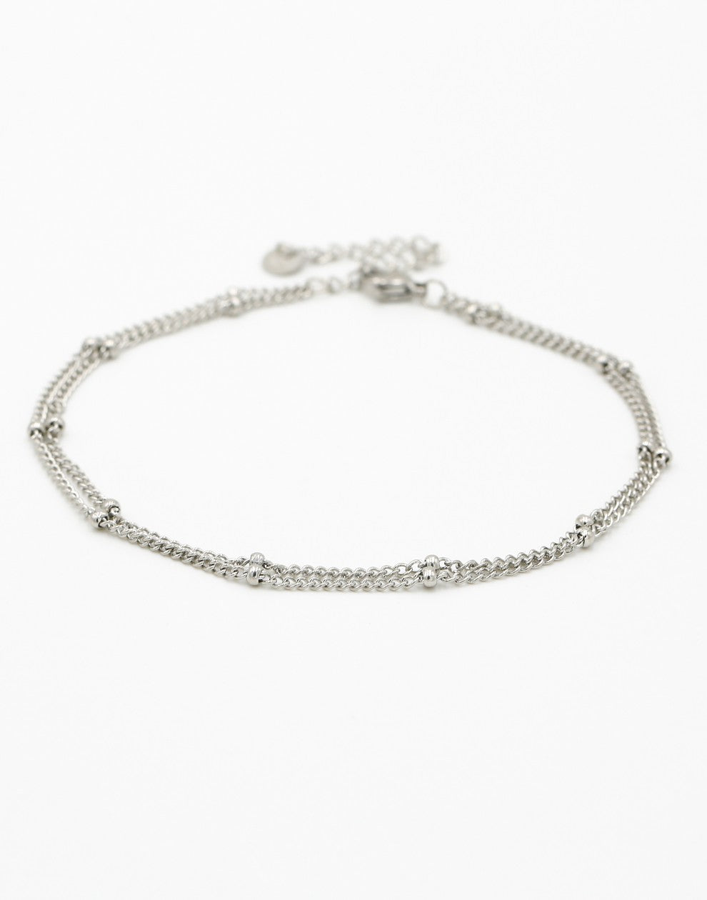 Ankle bracelet with double silver-colored beads