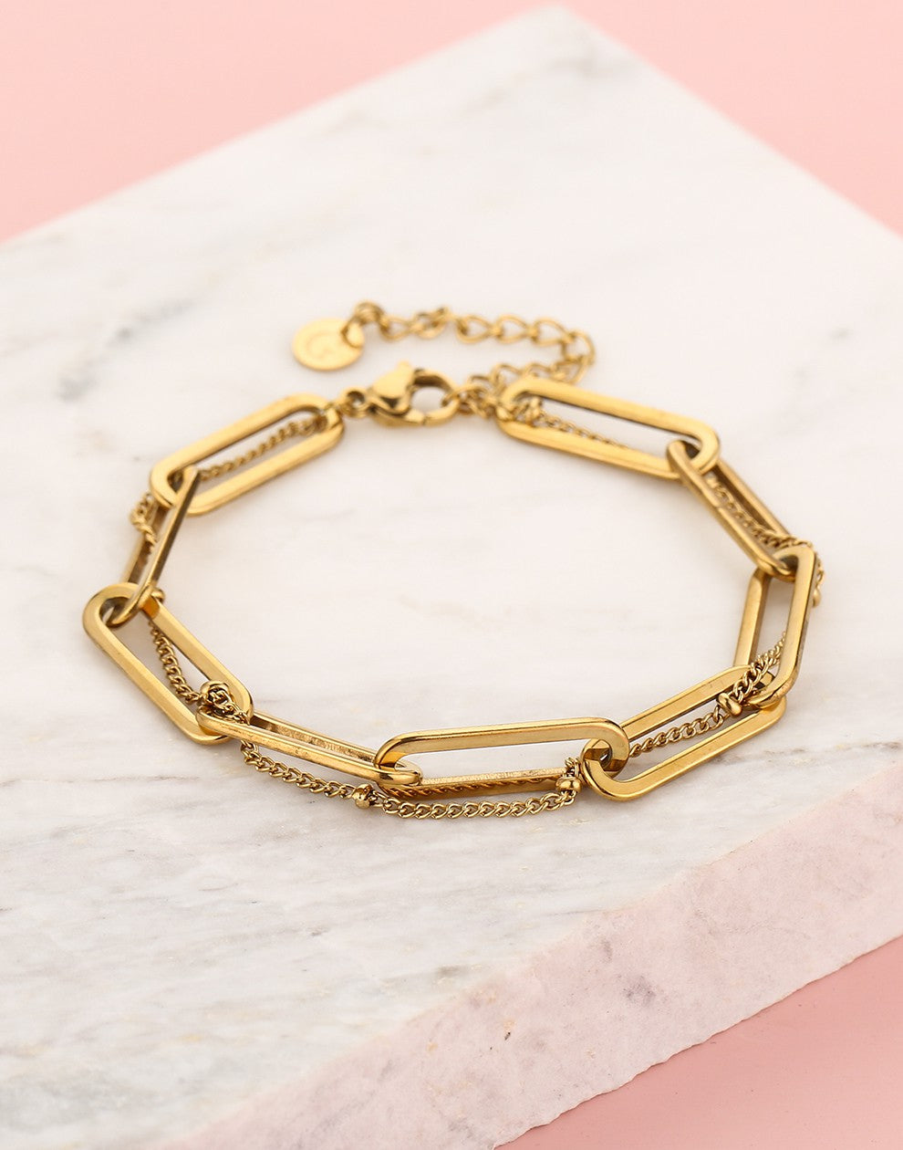 Schakelarmband gevlochten goudkleurig