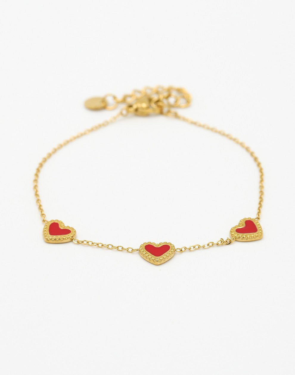 armband drie hartjes rood goudkleurig