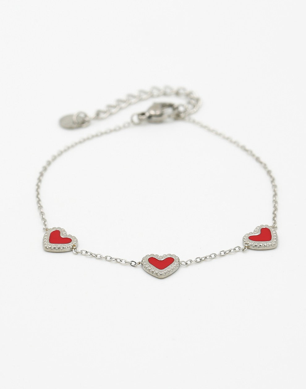 armband drie hartjes rood zilverkleurig