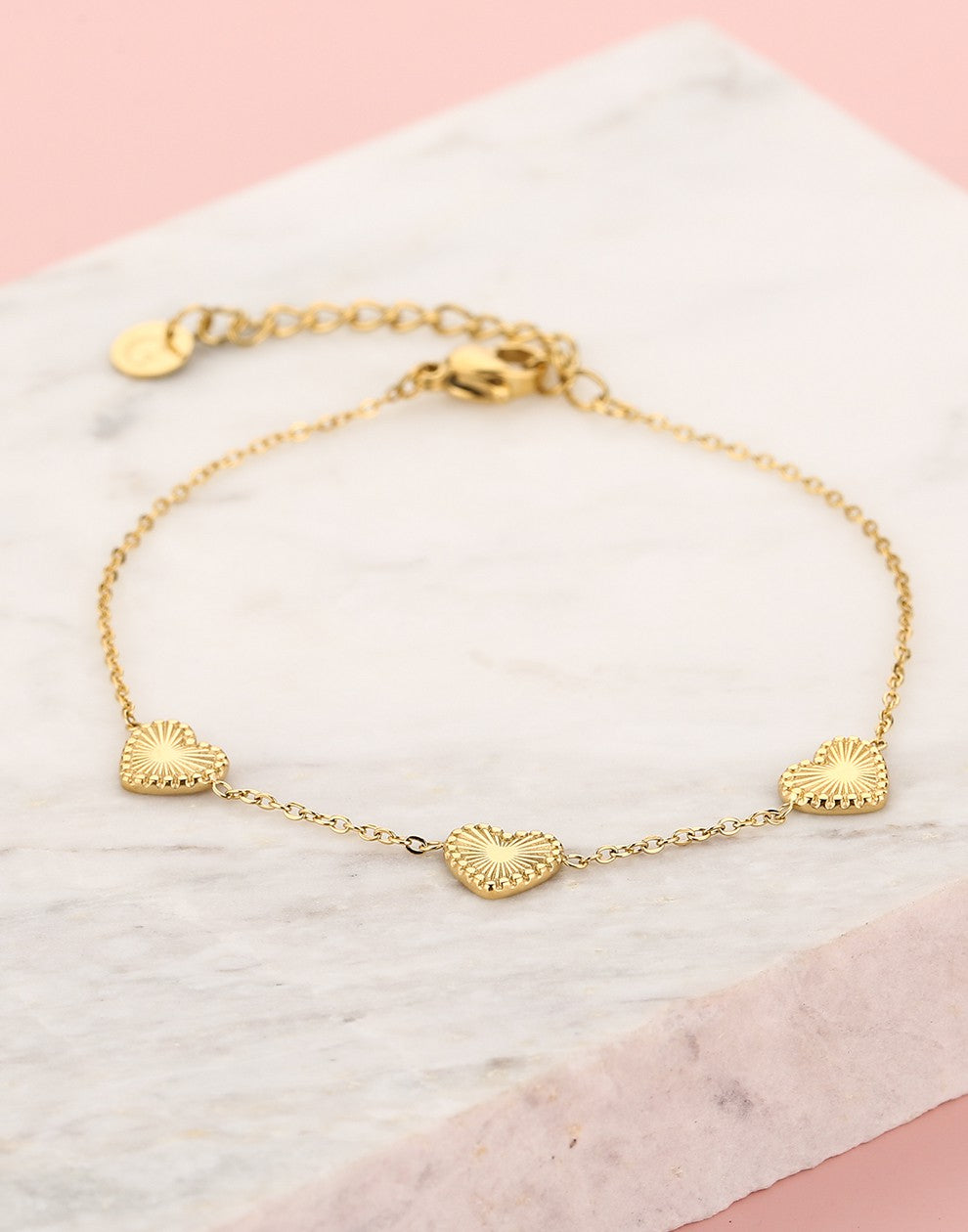armband vintage hartjes goudkleurig