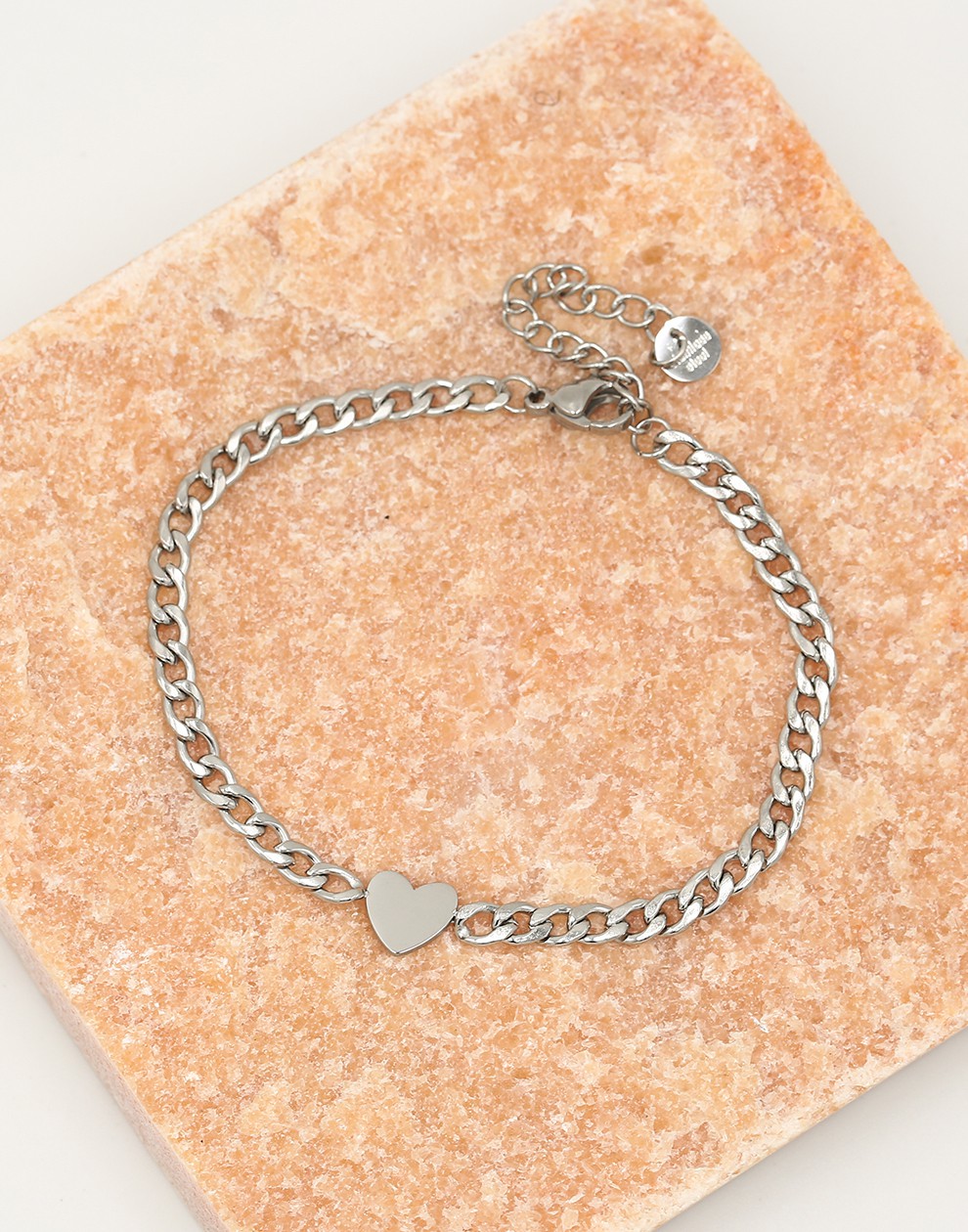 Schakelarmband met plat hartje zilverkleurig