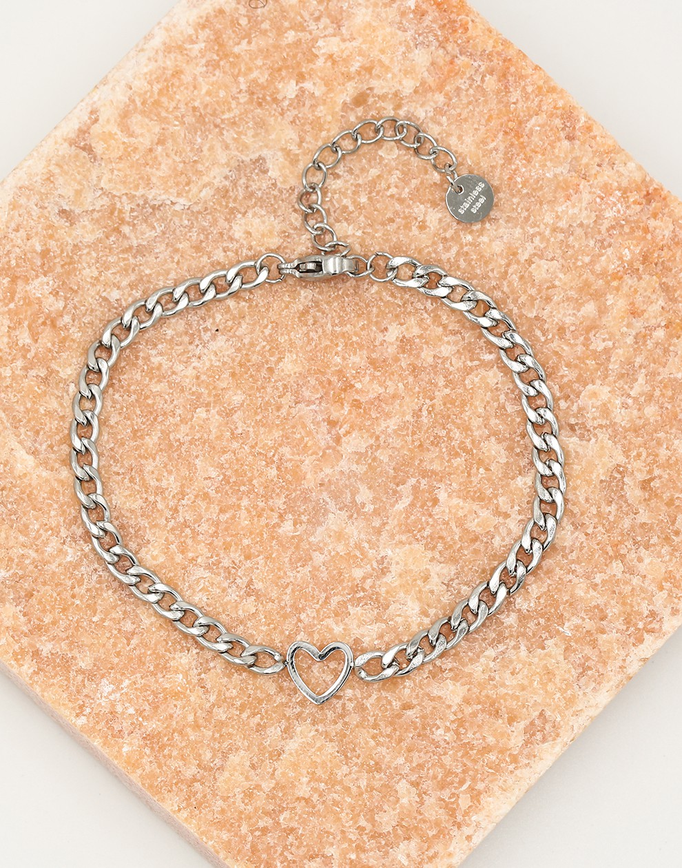 Schakelarmband met open hartje zilverkleurig