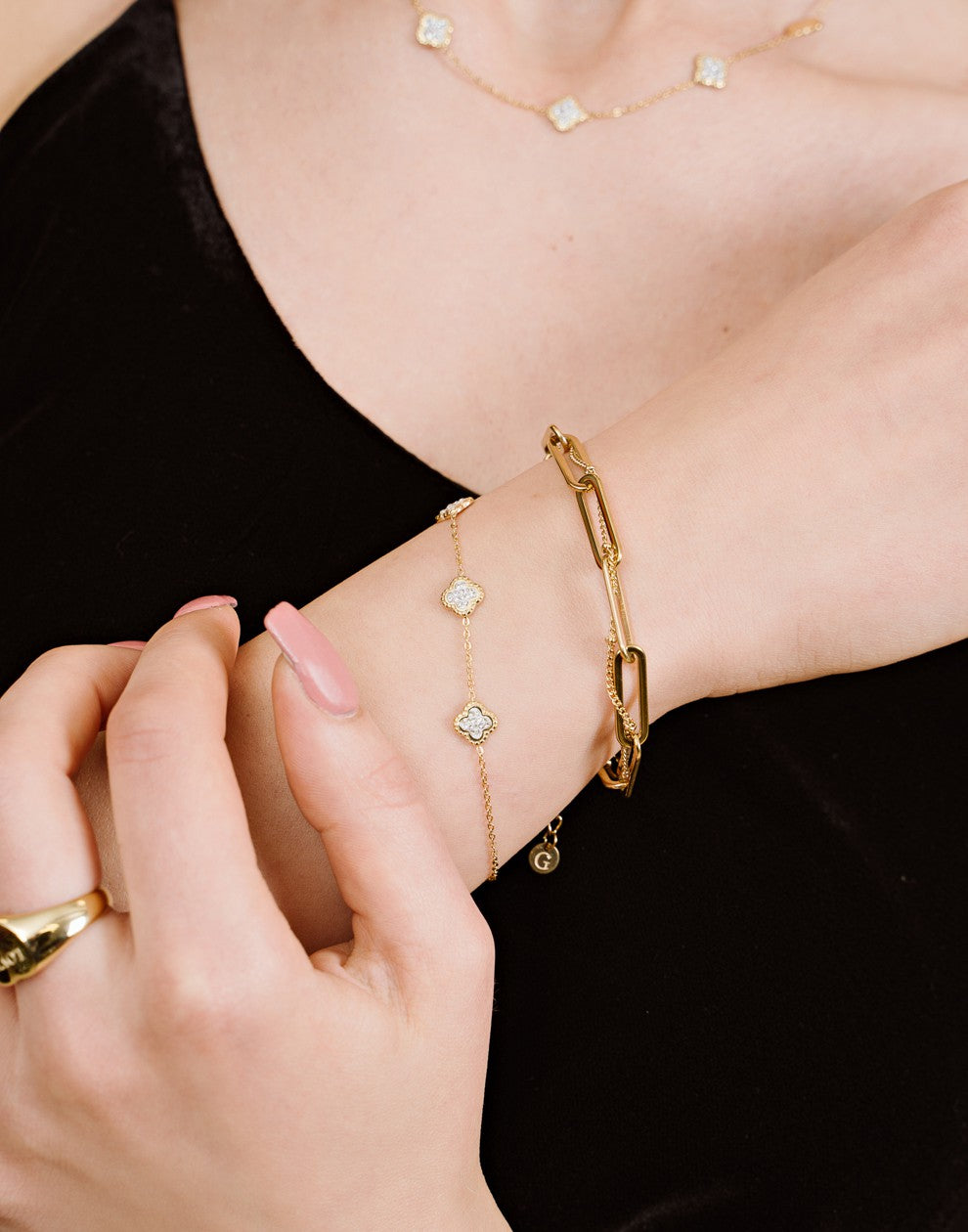 Schakelarmband gevlochten goudkleurig