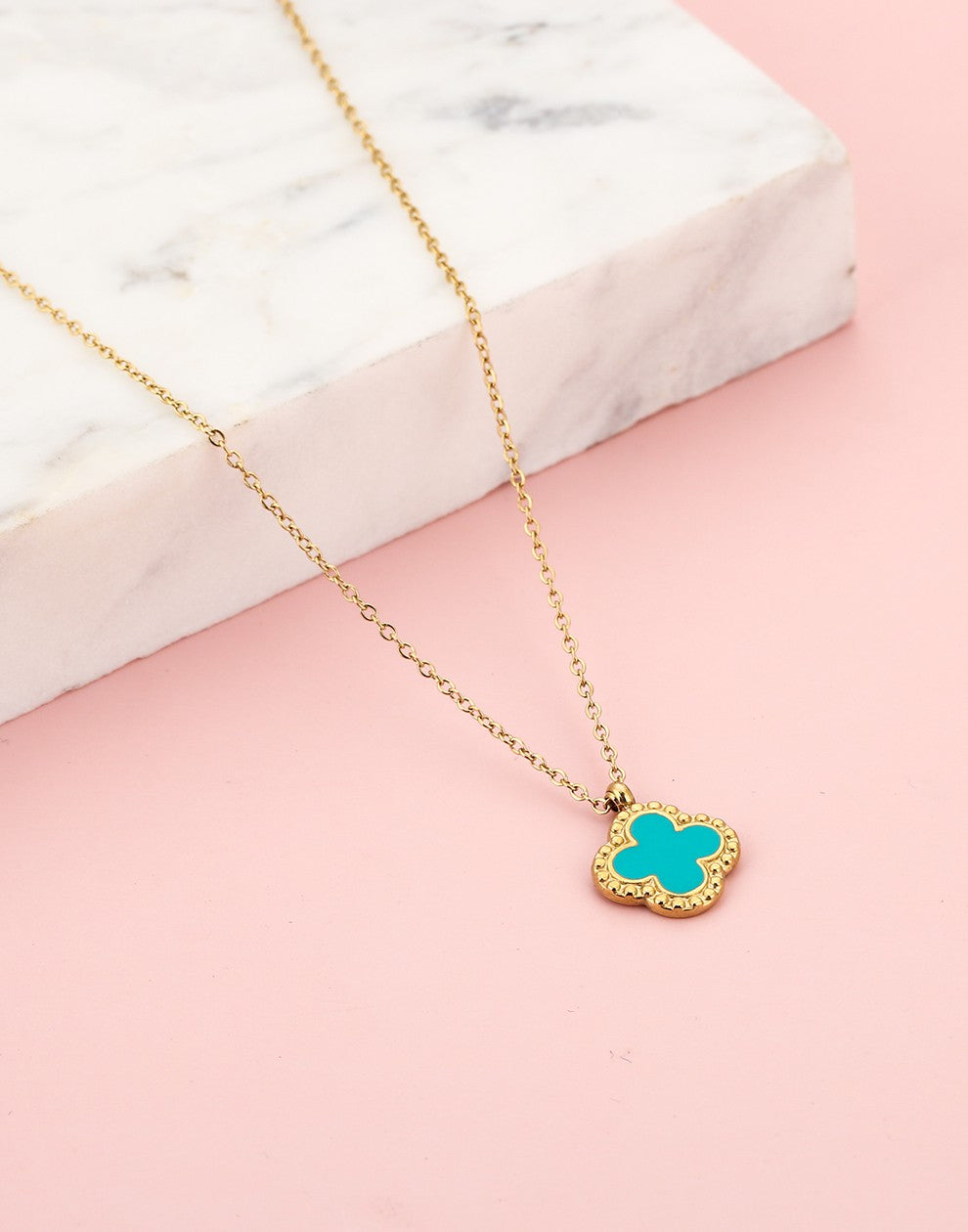 Lange ketting klaver turquoise goudkleurig