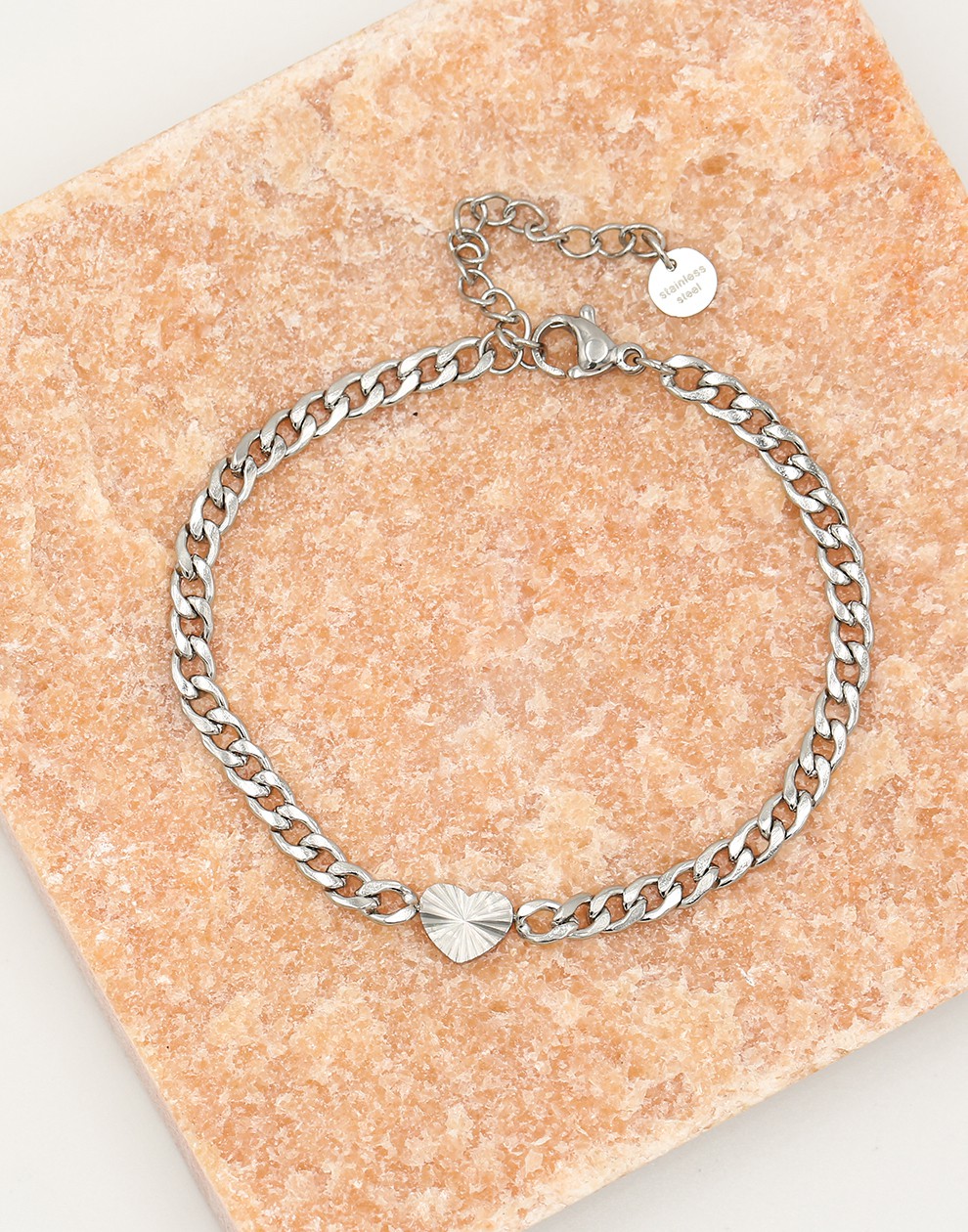 Schakelarmband hartje met motief in zilverkleurig