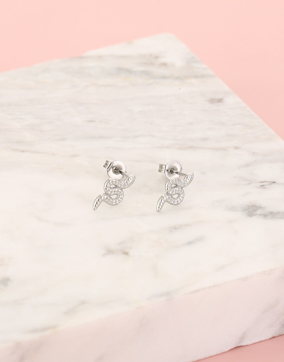 Studs snake silver colored