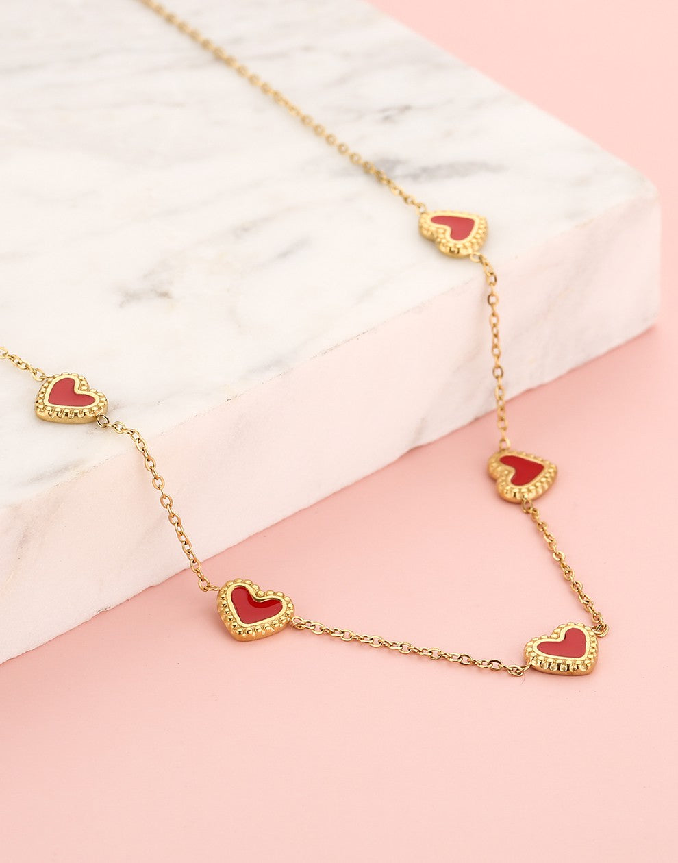 ketting vintage hartjes rood goudkleurig