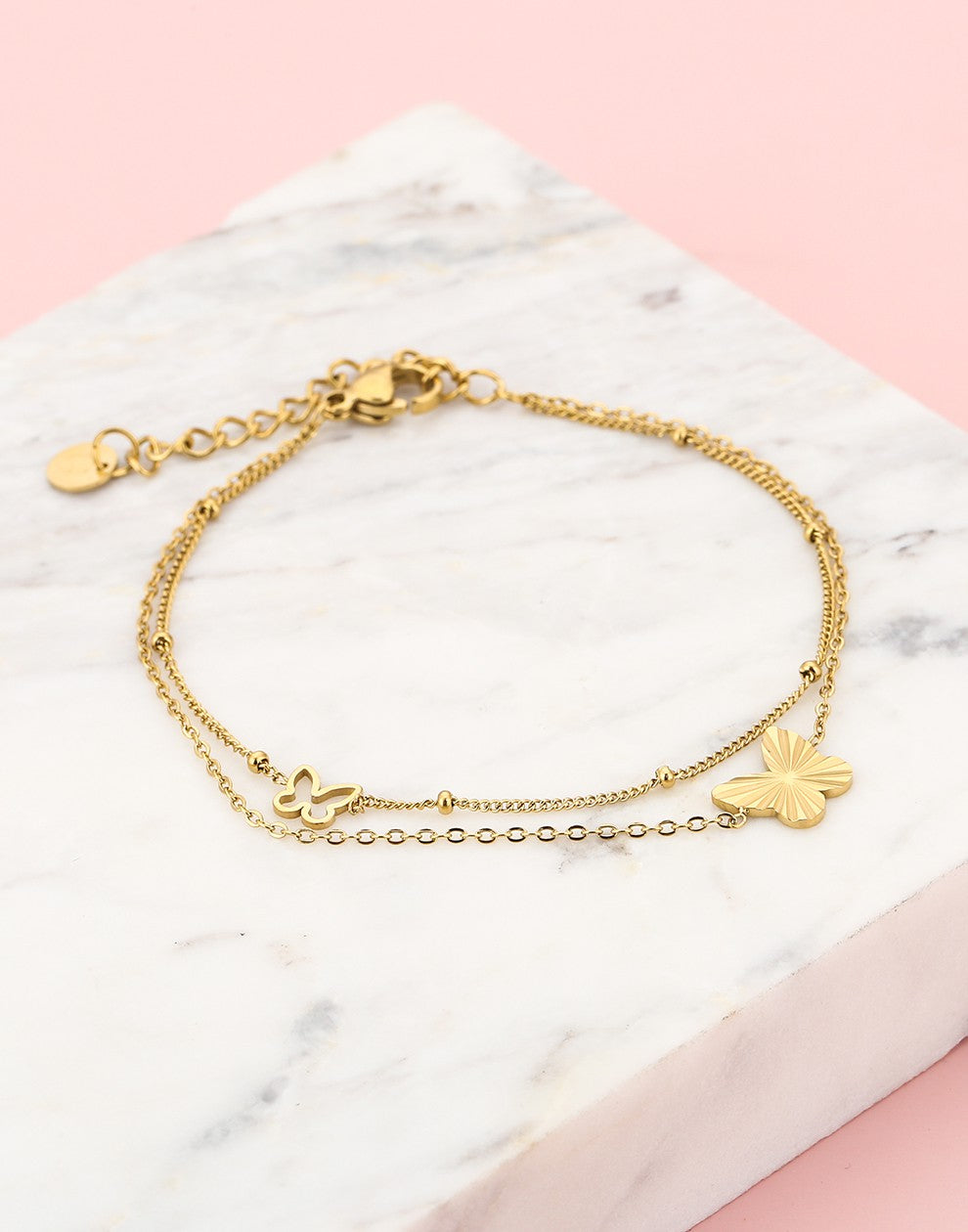 armband dubbel vlinders goudkleurig