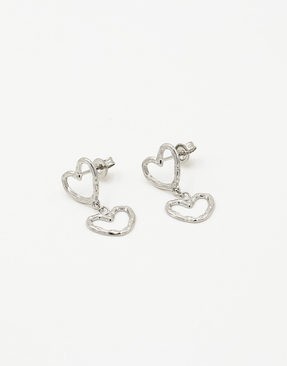 Oorsteker open hartjes zilverkleurig