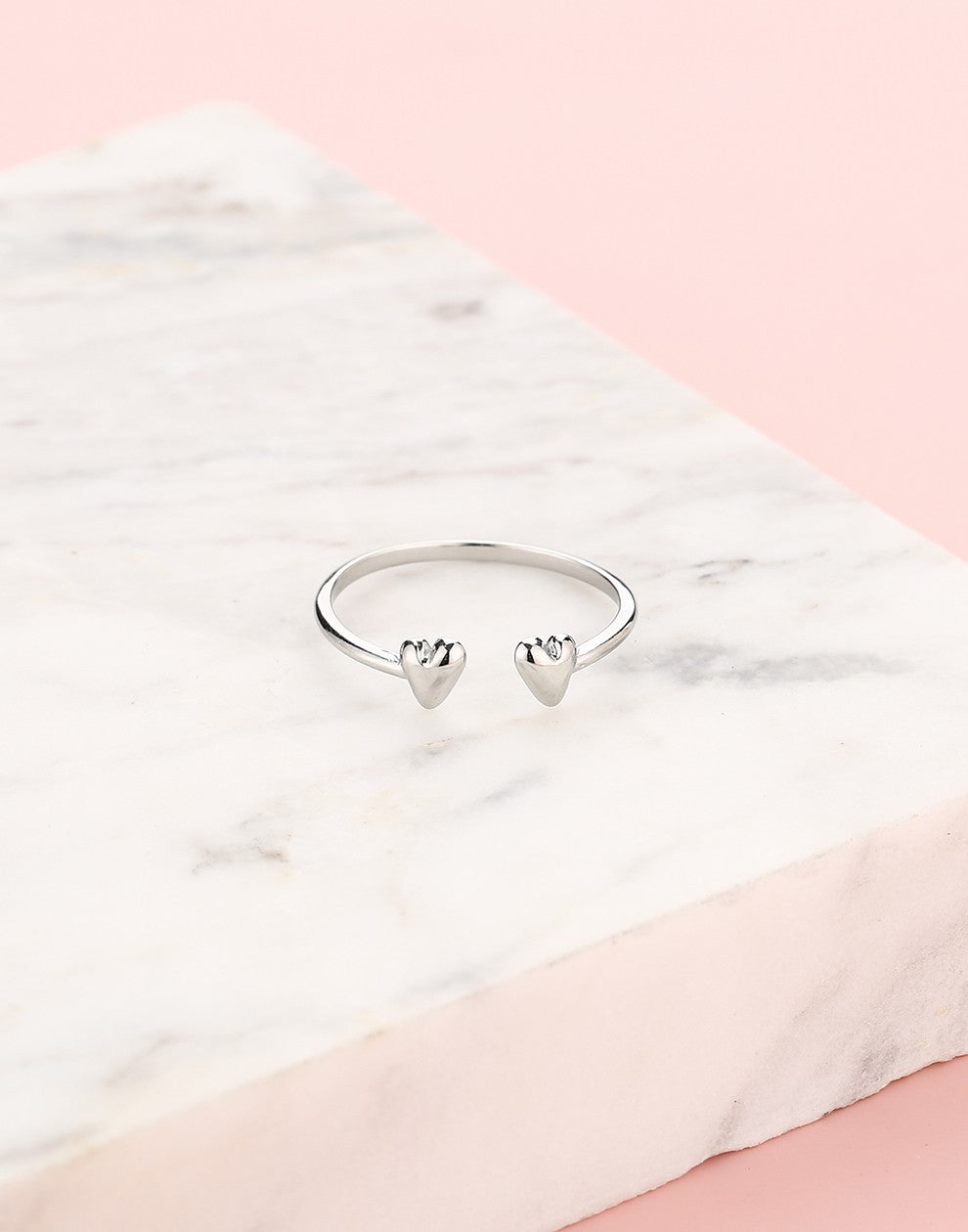 Ring speelse hartjes zilverkleurig