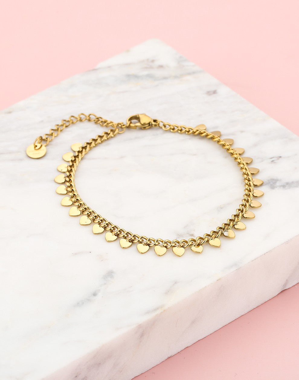 Schakelarmband met fijne hartjes goudkleurig