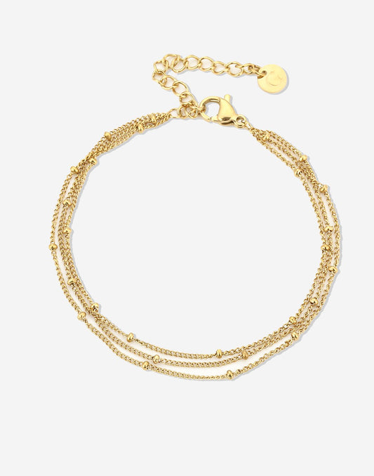 Armband goudkleurig bolletjes drielaags