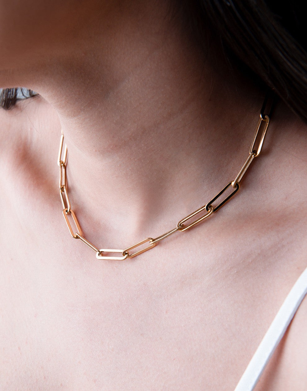 Chunky gold-colored paperclip link chain