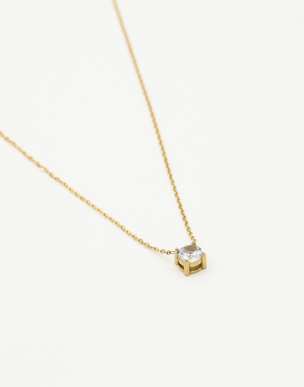 ketting steen rond goudkleurig