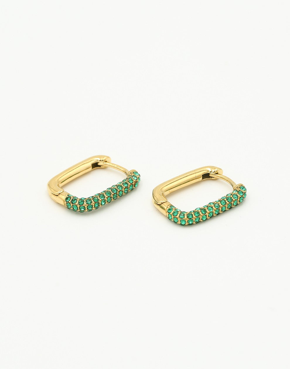 oval earrings with green and gold-colored stones