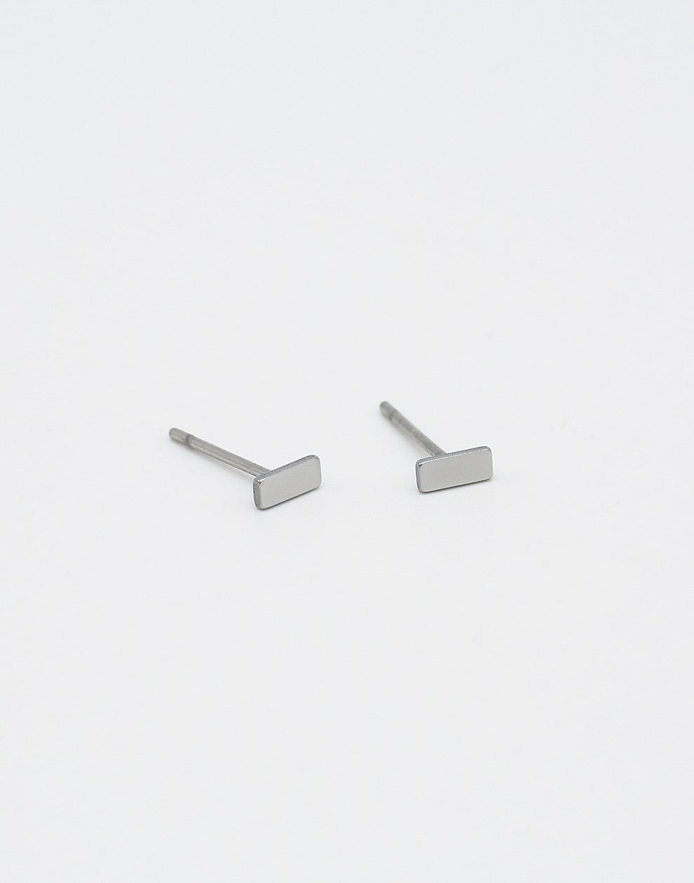 Silver-colored stud bar