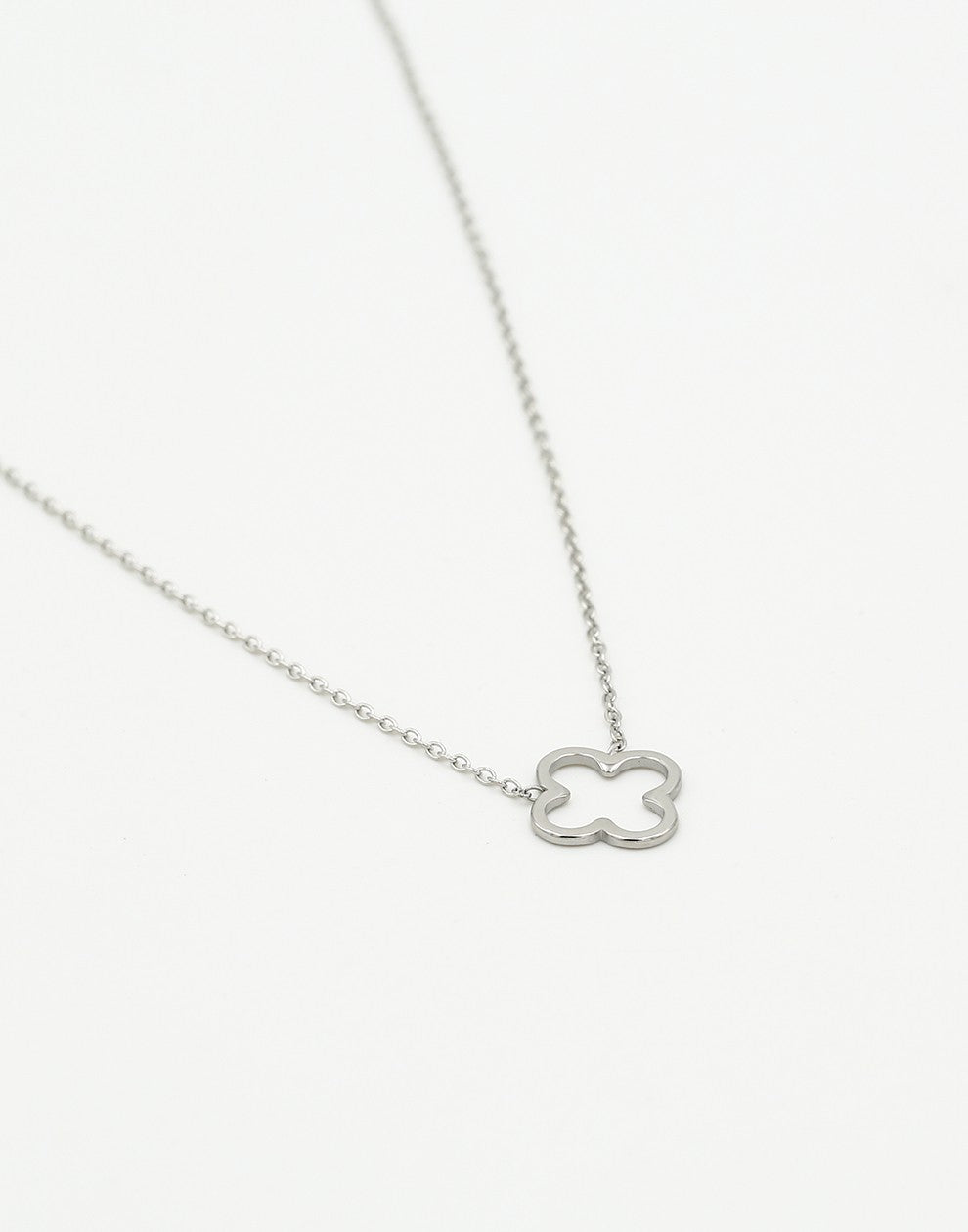 Silver-colored open clover necklace