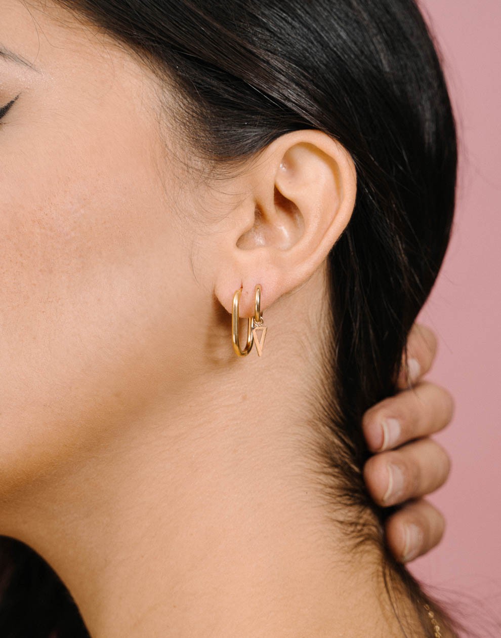 Fine oval gold-colored earrings