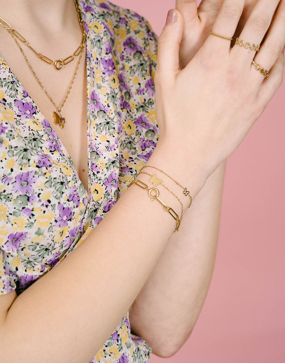 armband dubbel vlinders goudkleurig