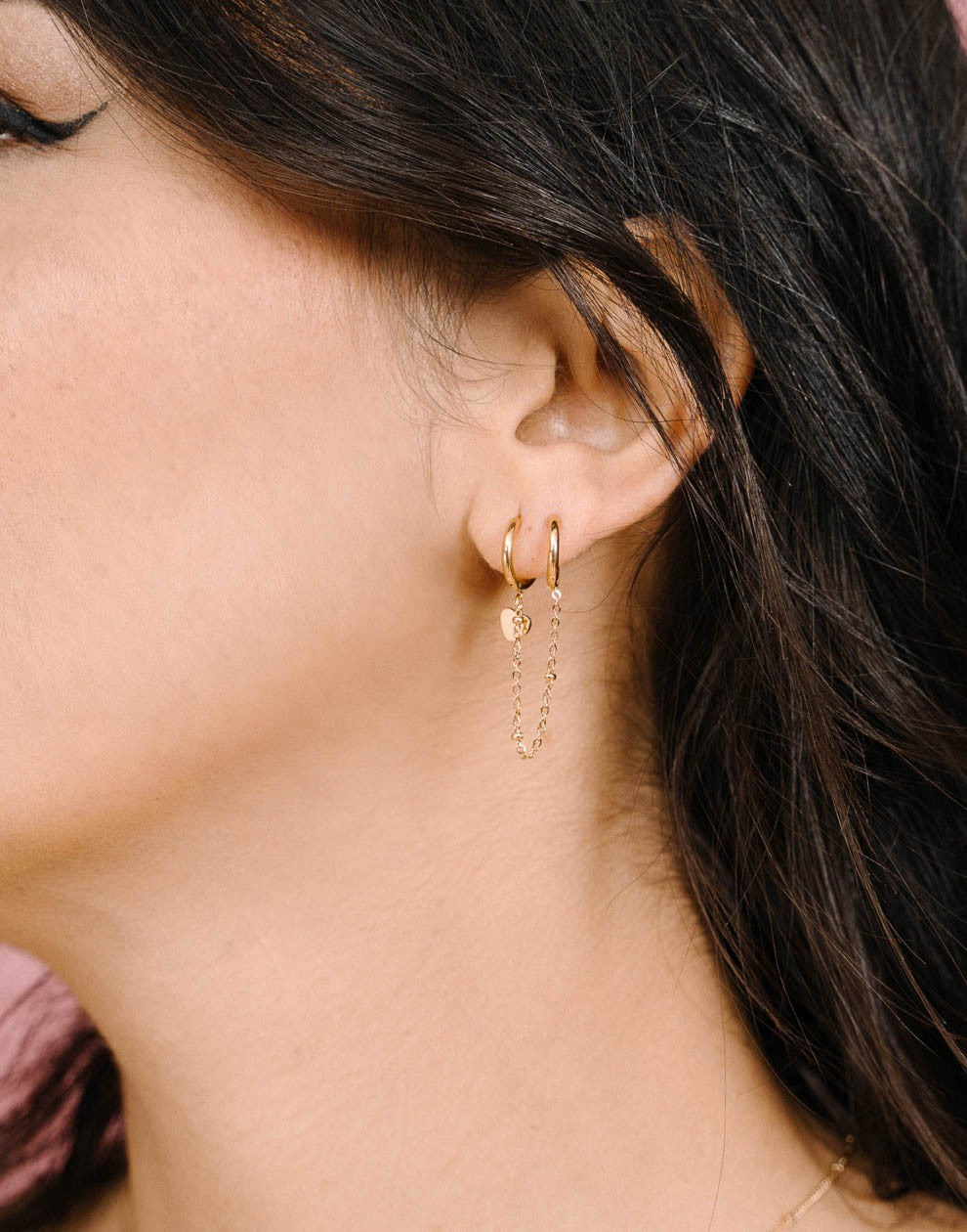 Double chain earrings with gold-colored heart