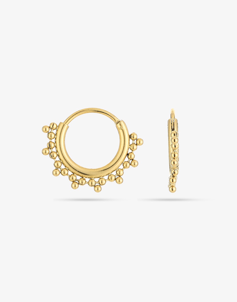 gold-colored hoop earrings