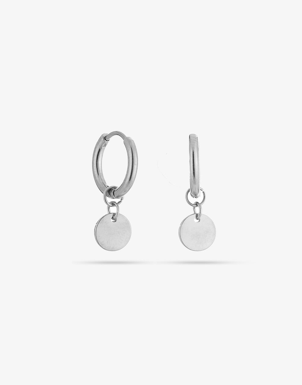 silver-colored coin earrings