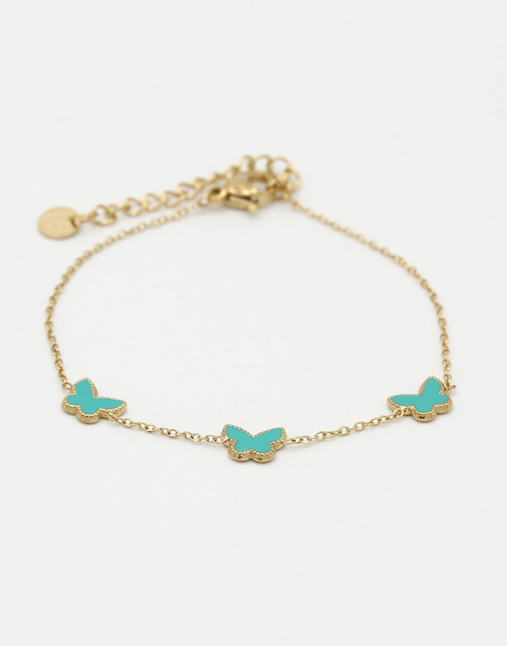 Armband vlinders turquoise goudkleurig