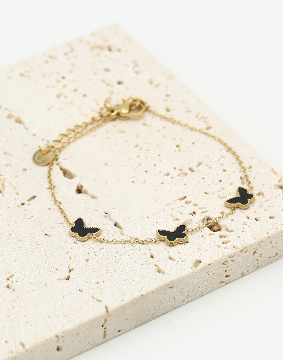 Armband vlinders zwart goudkleurig