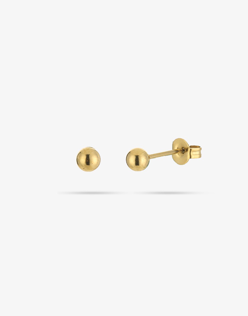gold-colored stud earring