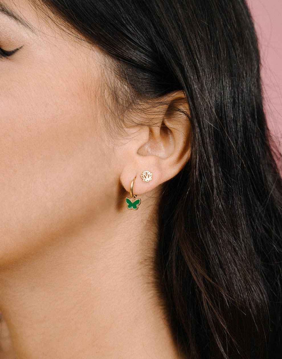 Gold-colored lotus flower stud earring