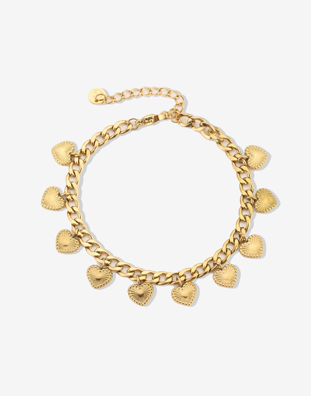 Schakelarmband vintage hartjes goudkleurig